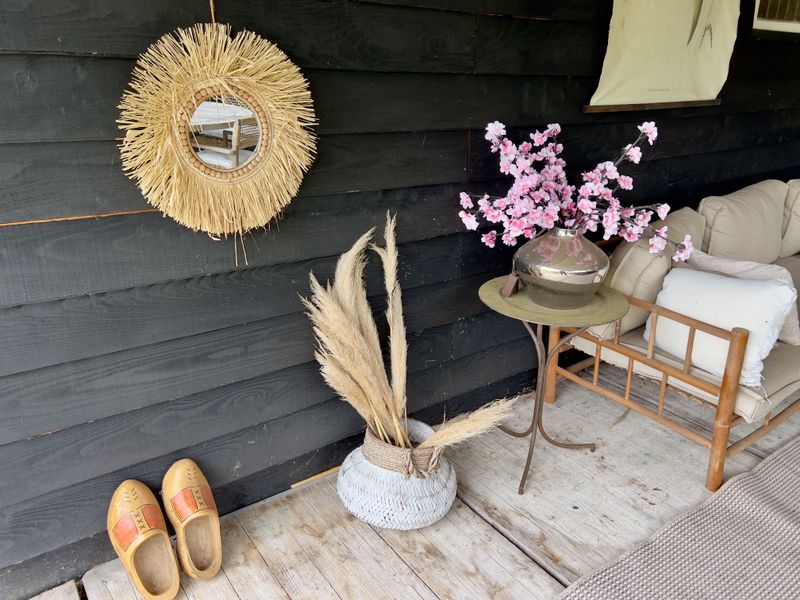 Zitgedeelte op de veranda, Huisje op de Dijk